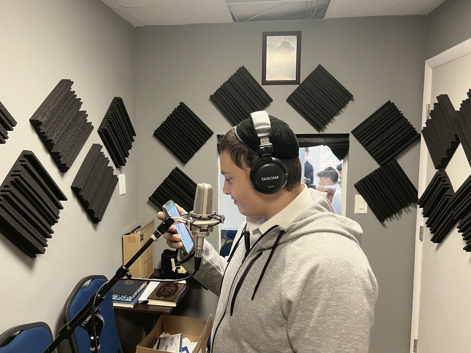 A talmid recording in the yeshiva studio